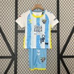 Maglia Málaga Prima Bambino 2024/2025 Maglia Málaga Prima Bambino 2024/2025